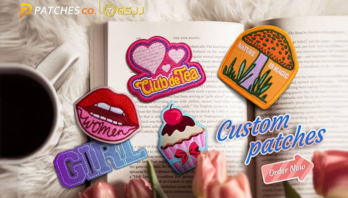 Google Memory Game - Startupeditor | Startup Editor Colorful custom patches displayed on an open book with flowers, resembling creative designs like the Google memory game.
