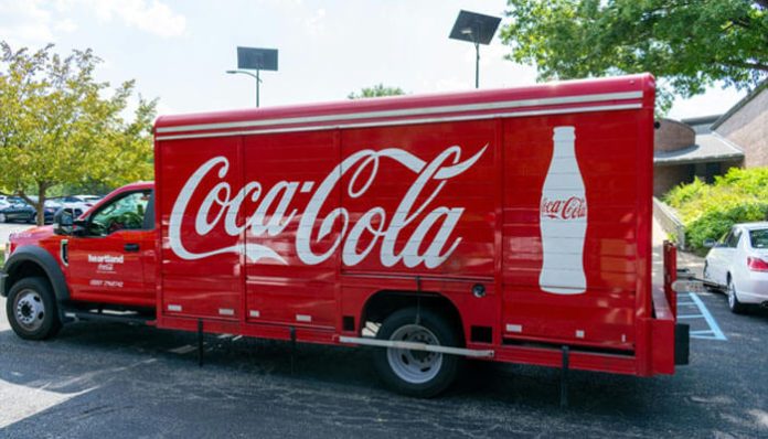 Commercial delivery truck on the road highlighting the importance of Commercial vehicle insurance for protecting business operations.