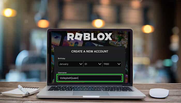A laptop screen showing a Roblox account creation page where a player is typing a creative username, representing ideas for good Roblox usernames for new players.