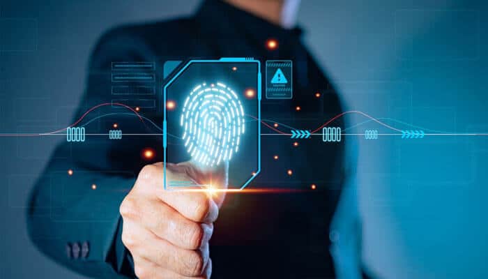 Business professional using digital fingerprint scanner for secure access, symbolizing data protection and modern creative business technology solutions.