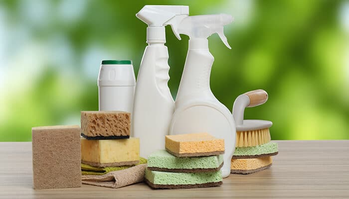 Eco-friendly cleaning supplies and reusable sponges representing sustainable business practices and smart Eco Choices for Brands.
