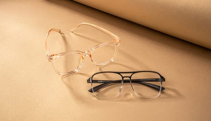 Two stylish pairs of eyeglasses displayed on a beige background, highlighting trendy frame options available through Black Friday glasses deals.