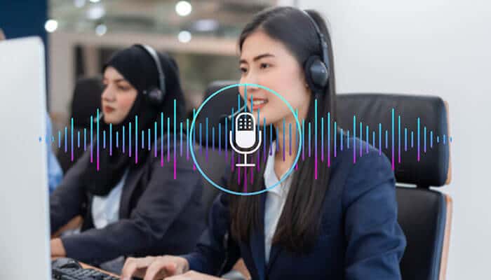 A customer support team using headsets with a voice recognition system visualized through sound waves, showcasing how AI in customer interactions enhances communication