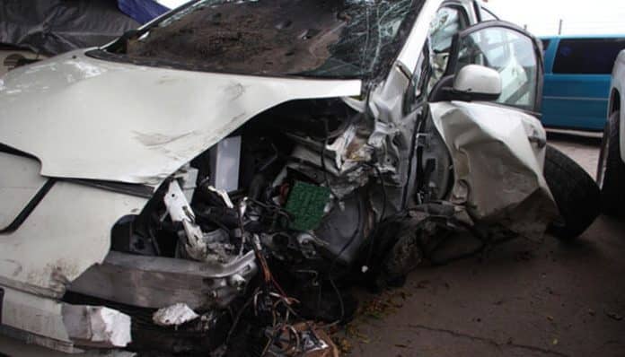 Severely damaged car after crash showing why legal guidance for car accident claims is essential for compensation and justice.