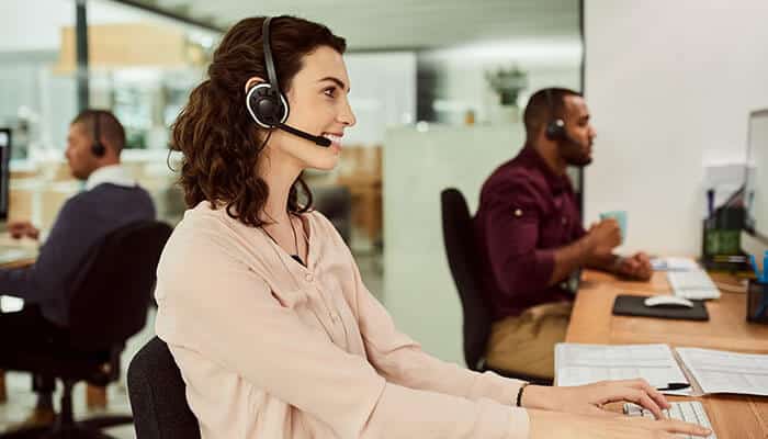 Customer service representatives handling inquiries, highlighting the importance of fast communication and follow-ups to avoid mistakes in property promotion