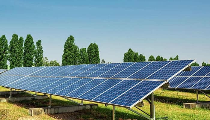 Solar panel installation supported by aluminum sheet metal fabrication structures for renewable energy projects.