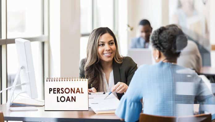 A financial advisor discussing personal loans with a client in an office setting, showing guidance and support for personal loan options.