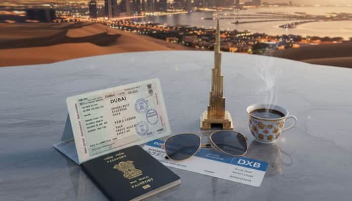 Indian passport, Dubai visa documents, and travel essentials placed on a table with a Dubai skyline view, representing Dubai visa for Indians.