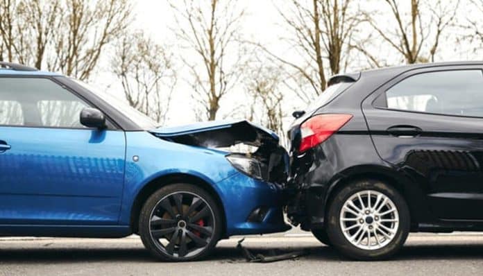 Two cars involved in a crash, emphasizing why it’s crucial to avoid certain phrases to avoid after a car crash to protect your legal rights and insurance claim.