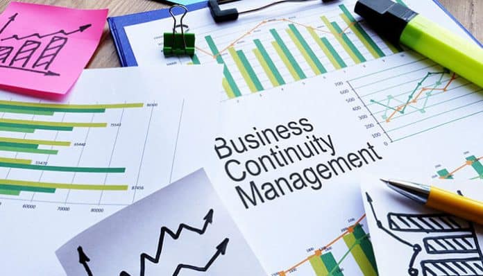 Business continuity management planning with charts, graphs, and strategic analysis to ensure seamless business operations during disruptions