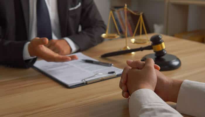 Client consulting with an attorney at Holliday Karatinos Law Firm regarding a legal case