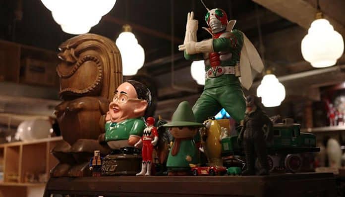 Various collectible figurines displayed in a shop, showcasing unique items perfect for a business selling collectibles. Collectible toys and figurines add character to the market