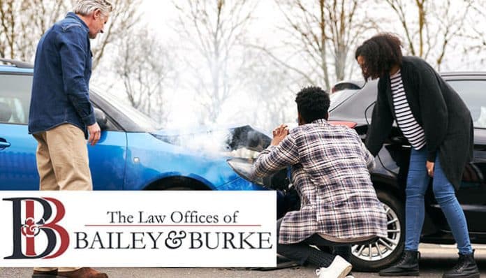 Bailey & Burke Attorneys helping victims at the scene of a distracted driving accident, providing expert legal support for injury claims and fair compensation