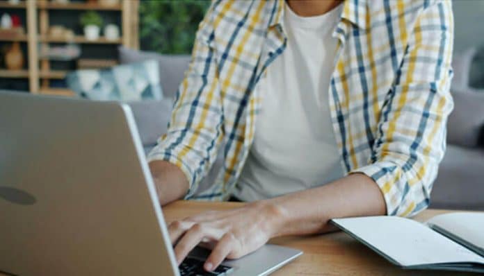 Freelancer Finance practices shown through organized invoice and accounting work on a laptop