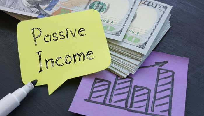 Illustration showing passive income growth with cash and charts, highlighting smart income strategies to fund your startup dream and support long-term business goals