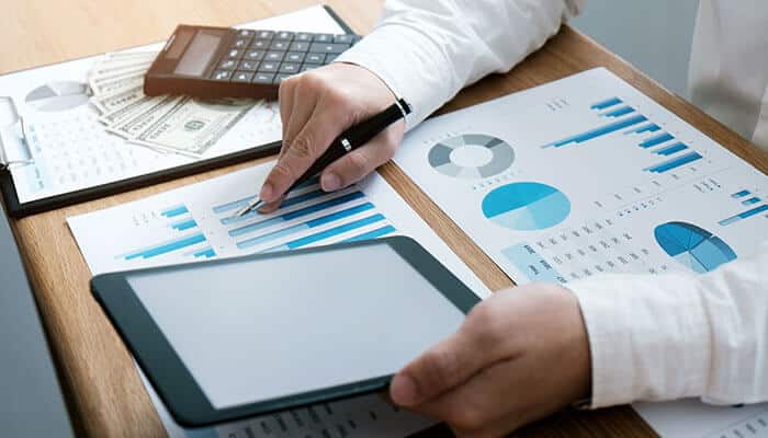 Analyzing performance metrics and revenue data to scale an online business effectively