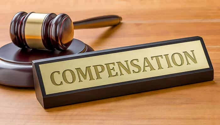 Compensation in rideshare accidents represented by a legal gavel and compensation sign highlighting injury claims