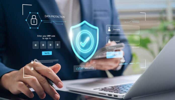 Person using a laptop with digital security icons, illustrating how to protect your privacy online effectively