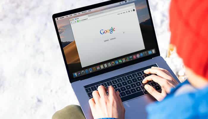 Google in 1998 homepage shown on a laptop screen, illustrating how users searched the internet using Google’s simple early interface