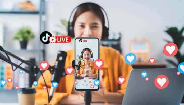 How to Go Live on TikTok showing a content creator streaming live with a smartphone, microphone, and engagement icons appearing on the screen.