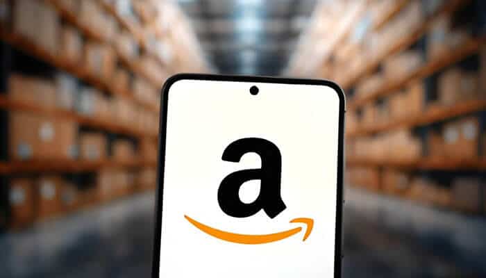 Amazon seasonal inventory management represented by the Amazon app inside a fulfillment warehouse during peak inventory operations