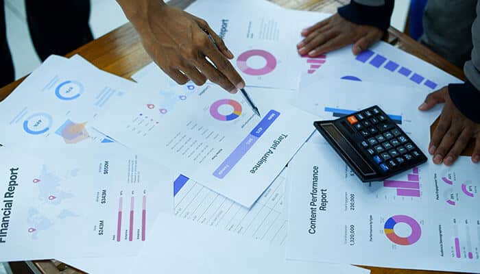 Financial report and graphs showing data analysis for perpetual inventory system.