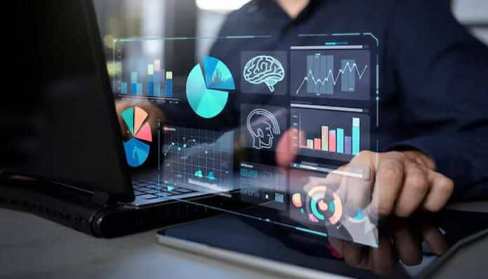 A person analyzing business data through business intelligence tools displayed on a laptop, showcasing the power of data visualization and analytics.