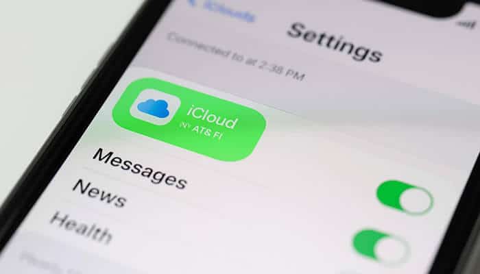 Enable iCloud Sync for Messages - Startupeditor | Startup Editor Close-up of an iPhone screen showing the iCloud settings, with the Messages toggle enabled, indicating cloud syncing for messages