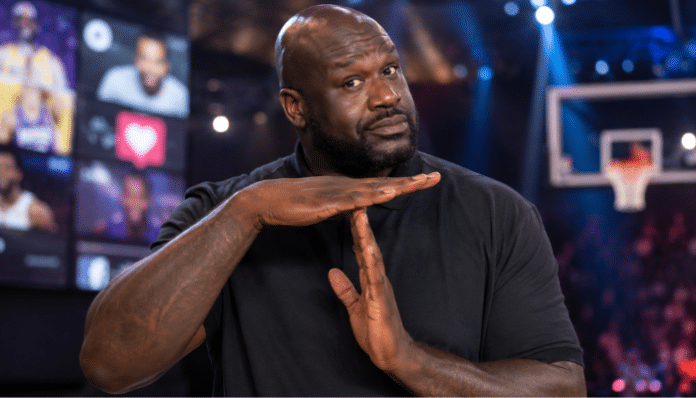 Shaq Timeout meme concept showing a basketball figure making a timeout hand gesture in a sports arena setting.