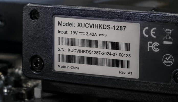 use model xucvihkds number concept shown on a device identification label displaying model XUCVIHKDS-1287 with serial details, power specifications, and compliance markings, representing structured hardware identification, system configuration tracking, and accurate device authentication in modern IT infrastructure management.