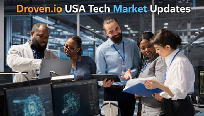 Team of technology professionals reviewing data and reports in a modern office for Droven.io USA Tech Market Updates