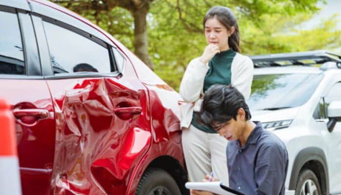 Accident Claims assessment following a vehicle collision, showing individuals documenting car damage for insurance and legal purposes while highlighting the role of accident claims in identifying road safety risks, improving traffic infrastructure, supporting public safety initiatives, and preventing future accidents through data-driven analysis.