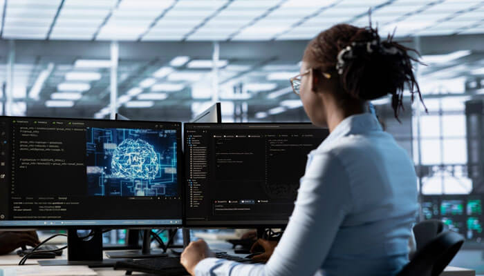 Step-by-Step Roadmap to Get an AI Job in 2026 - Startupeditor | Startup Editor Droven io Best AI Jobs in USA showing an AI professional working at dual monitors with machine learning code and advanced digital systems