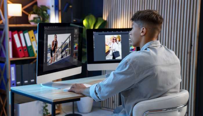 | Startup Editor Professional designer using Freepik AI Image Generator to edit and enhance digital photos on a desktop workstation