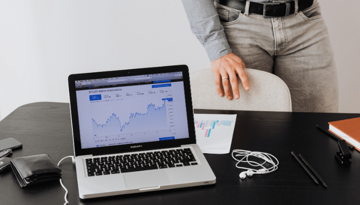 What Google Search Console Adds | Startup Editor Person reviewing an analytics dashboard on a laptop as part of a Google Analytics Yoast SEO reporting workflow.