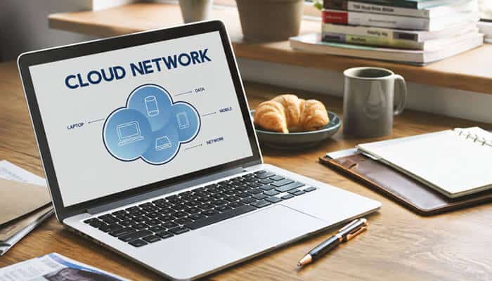Where Does the Company Fit Within Foxconn's Cloud and Networking Business? - Startup Editor | Startup Editor Cloud Network Technology Singapore Pte. Ltd concept showing a laptop with cloud-connected devices representing computer, server and networking technology operations.