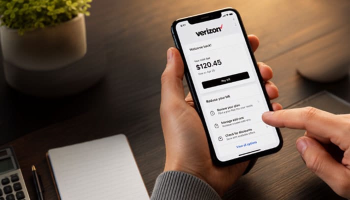 How to Lower Your Verizon Bill Before Financing It - Startupeditor | Startup Editor Can You Use Afterpay to Pay Verizon Bill while managing Verizon payment options on a smartphone