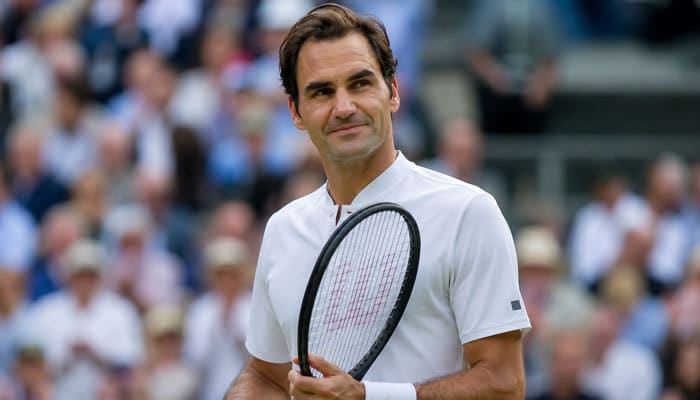 Who Is Roger Federer - Startupeditor | Startup Editor Roger Federer and Bill Rogers article featuring Federer on the tennis court