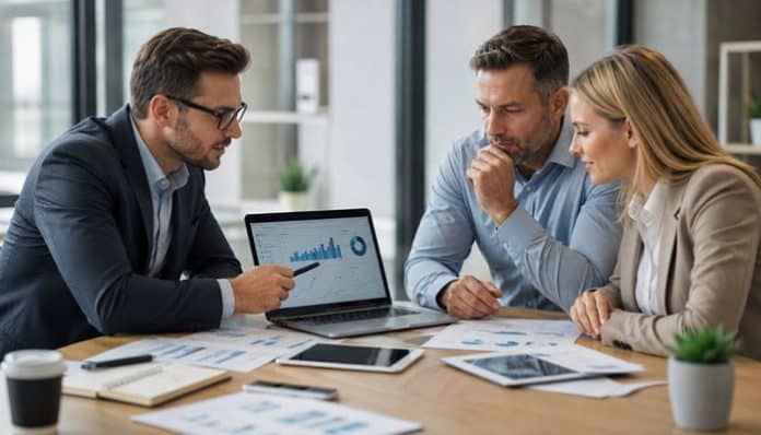 Why business consulting is important RoarBiznes with consultant reviewing business performance data with company leaders