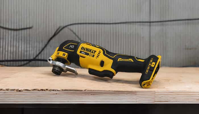How Good Is the DCS356 at Cutting? - Startup Editor | Startup Editor DEWALT Oscillating Multi Tool Review featuring the DEWALT DCS356 20V MAX brushless oscillating multi-tool, showcasing its compact ergonomic design, LED work light, Quick-Change accessory system, and professional-grade performance.