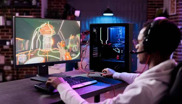 Claimed PC System Requirements - Startup Editor | Startup Editor PC gamer playing at a desktop setup while researching the reported Innerlifthunt release date and platform claims.