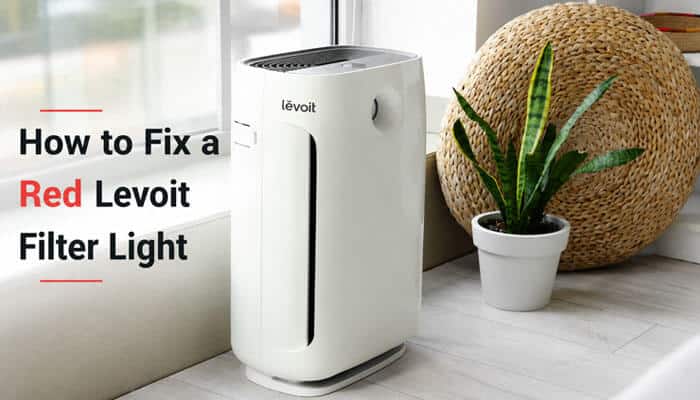 How to Fix a Red Levoit Filter Light - Startup Editor | Startup Editor Levoit air purifier beside a houseplant with text explaining how to fix a Levoit Air Purifier Red Light and troubleshoot the filter replacement indicator.