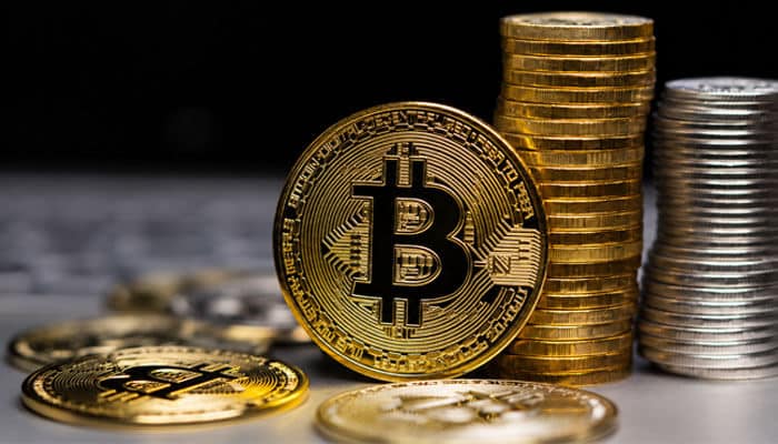 Is CryptoProNetwork Adrian Reliable for Crypto Research? - Startup Editor | Startup Editor CryptoProNetwork Adrian cryptocurrency concept featuring Bitcoin and stacked coins representing digital assets, blockchain, and crypto finance.