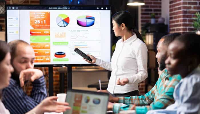 What Services Does a Display Advertising Agency Offer? - | Startup Editor Display Advertising Agency team presenting visual marketing reports and digital advertising strategies using analytics dashboards for campaign optimization