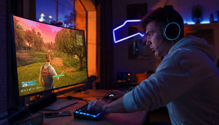 Latest Patch Notes and Live-Service Changes - Startup Editor | Startup Editor Latest Gaming Updates Zeromagtech showing a headset-wearing PC gamer playing an action game, representing 2026 releases, updates, and gaming trends.
