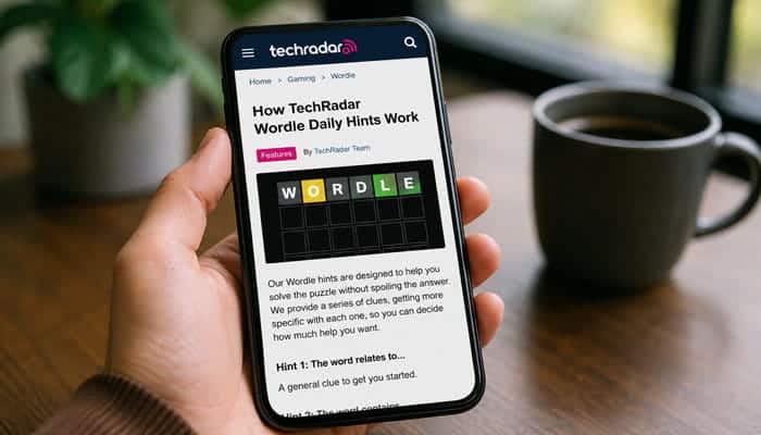 How TechRadar Wordle Daily Hints Work - Startupeditor | Startup Editor TechRadar Wordle daily hints guide displayed on a smartphone.