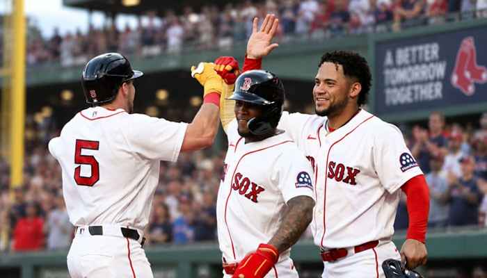 Key Red Sox Player Performances - Startup Editor | Startup Editor Red Sox vs New York Yankees Match Player Stats featuring Boston Red Sox players celebrating a key moment during the MLB matchup with team performance highlights.