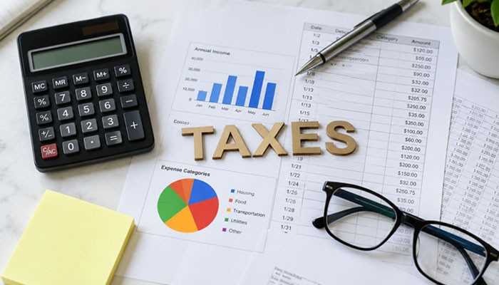 How Long Does an IRS Refund Take in 2026? - Startup Editor | Startup Editor IRS Refund Tracker 2026 tax planning concept with calculator, financial records, charts and tax documents used to review refund information.
