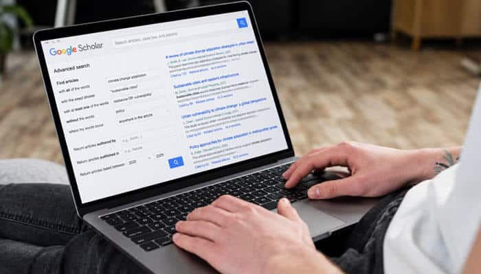 Google Scholar Advanced Search for Literature Reviews - Startup Editor | Startup Editor Google Scholar Advanced Search interface showing exact phrase, author, publication, excluded keyword, and date filters alongside academic search results.