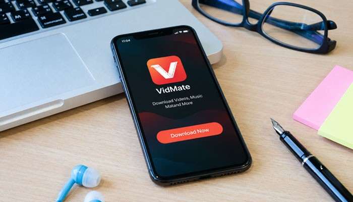 How to Install VidMate on Android - Startup Editor | Startup Editor VidMate Download Application App displayed on a smartphone with download options, highlighting Android APK installation, video saving features, and mobile media management.